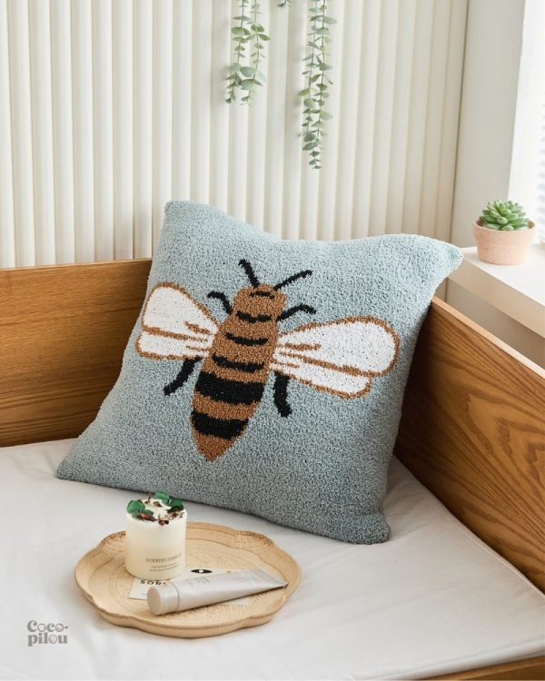 Douceur et confort avec le coussin Pilou