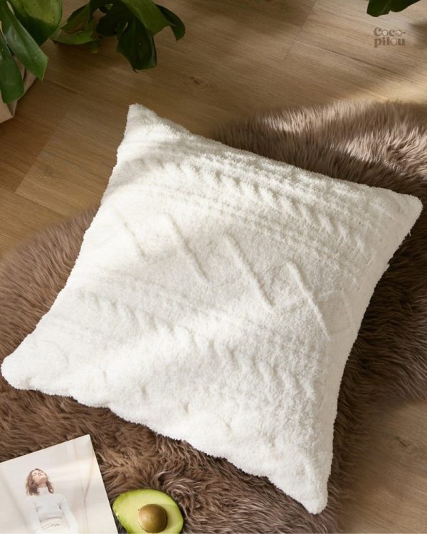 Coussin moelleux blanc pour un confort optimal à la maison