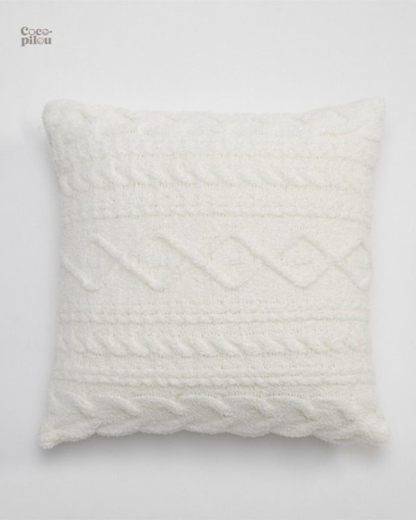 Coussin doux pour créer une ambiance chaleureuse et cosy