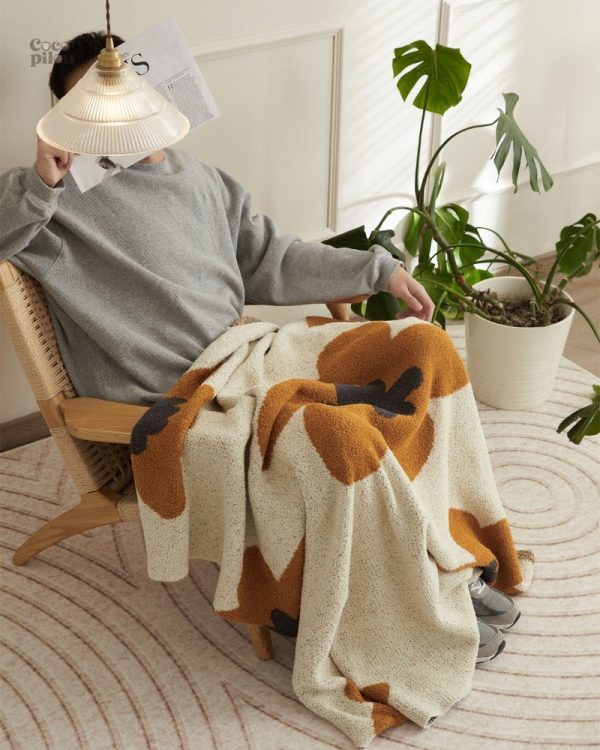 Couverture doudou légère, parfaite pour les nuits paisibles