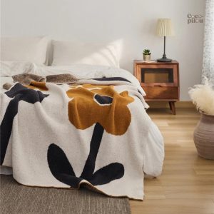 Couverture fausse fourrure douce et chaleureuse