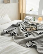 Couverture douce flanelle, accessoire cosy pour le canapé