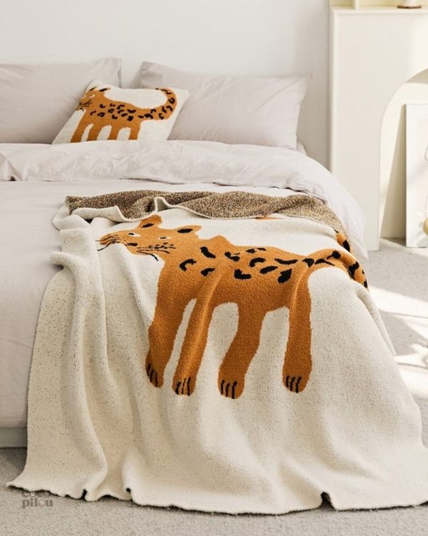 Plaid beige léger pour les soirées cocooning à la maison