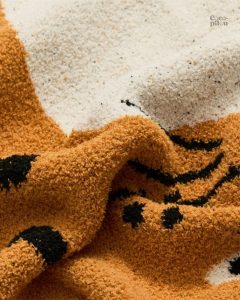 Couverture Pilou Pilou beige, idéale pour se blottir confortablement