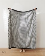 Plaid doux et chaleureux, idéal pour le salon cozy
