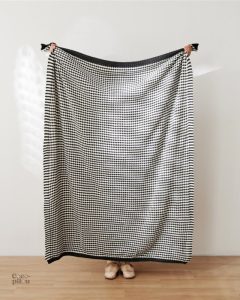 Plaid doux et chaleureux, idéal pour le salon cozy