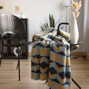 Couverture Pilou Pilou en duvet, chaleur et douceur