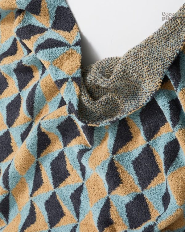Plaid duvet, accessoire cosy pour votre salon