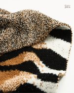 Couverture fausse fourrure, idéale pour les soirées cocooning