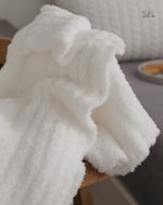 Plaid blanc ultra doux pour un confort optimal