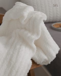 Plaid blanc ultra doux pour un confort optimal