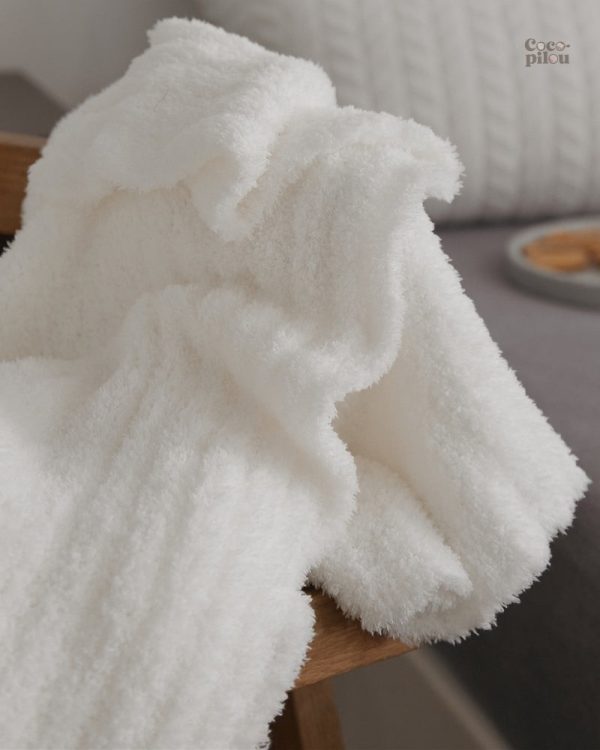 Plaid blanc ultra doux pour un confort optimal