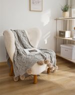 Plaid fourrure gris doux et chaleureux pour votre intérieur