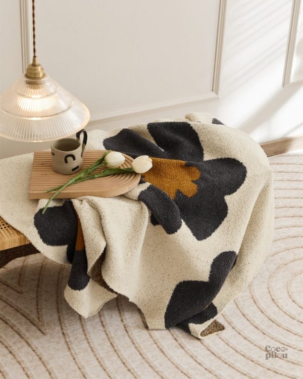 Couverture Pilou Pilou chaleureuse, idéale pour l'hiver
