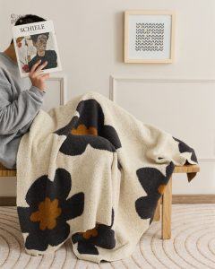 Couverture douce en pilou pilou, parfaite pour le cocooning