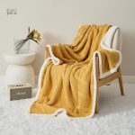 Plaid moumoute doux et confortable pour les soirées cocooning