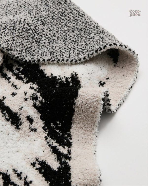 Couverture moelleuse mouton, parfaite pour les soirées cocooning