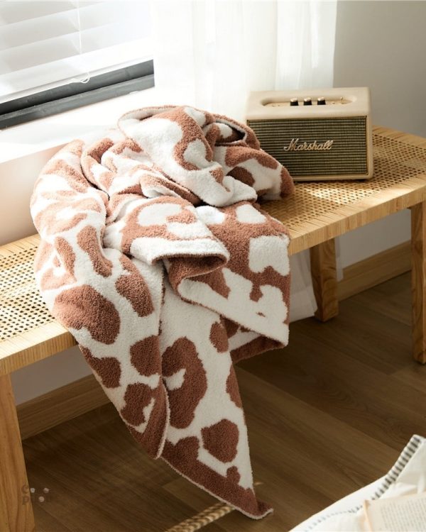 Plaid Pilou coloré pour une touche de chaleur dans votre intérieur