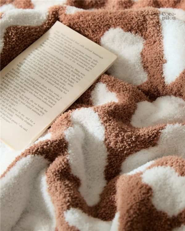 Couverture Pilou douce, parfaite pour les moments de détente