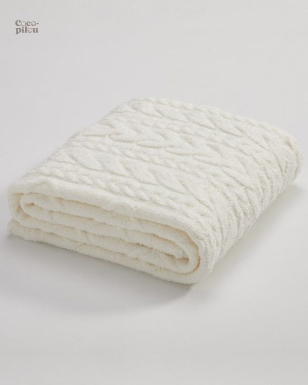 Plaid polaire blanc, accessoire tendance et cosy