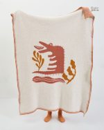Plaid rose moelleux, accessoire cosy pour votre intérieur