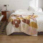 Plaid sherpa doux et chaud, idéal pour les soirées cocooning