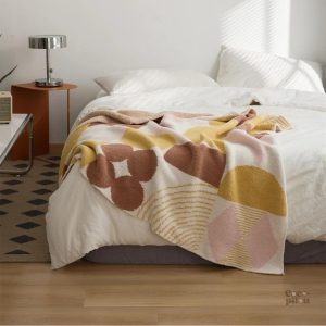 Plaid sherpa doux et chaud, idéal pour les soirées cocooning